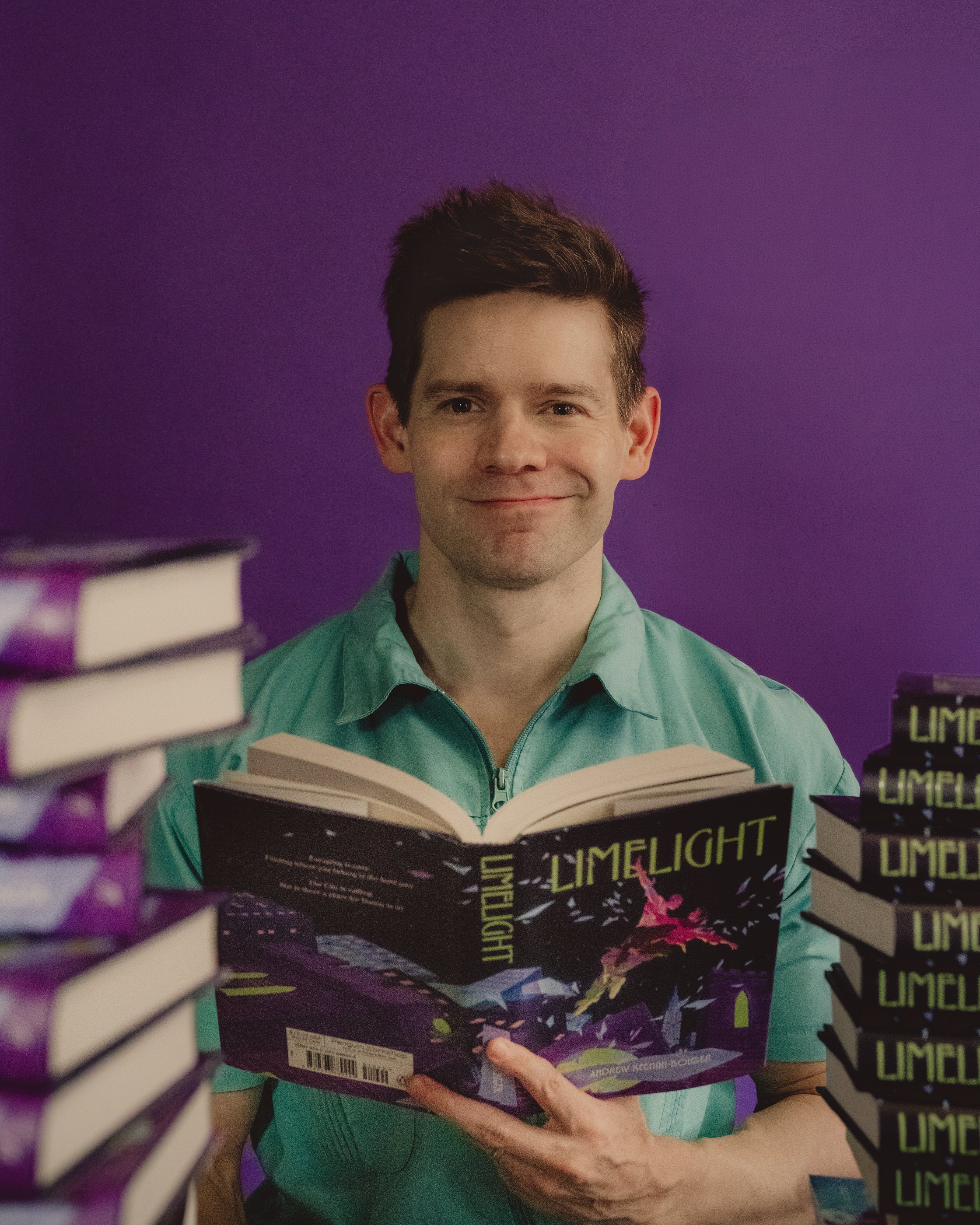 Andrew Keenan-Bolger holding a copy of Limelight